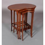 A SET OF THREE EDWARD VII MAHOGANY OCCASIONAL TABLES, outlined throughout with barber pole