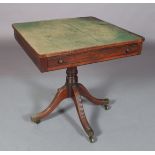 A REGENCY MAHOGANY PEDESTAL TABLE, the square top inset with a green felt surface, reeded lip