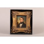 A 19TH CENTURY MINIATURE PORTRAIT OF A YOUNG GENTLEMAN, head and shoulders, standing in a landscape,
