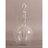 A 19TH CENTURY DUTCH GLASS DECANTER AND STOPPER, the spherical body wheel engraved with windmills,