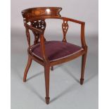 AN EDWARD VII MAHOGANY OCCASIONAL ARMCHAIR, the broad top rail inlaid in satinwood with fan