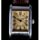 A JAEGER-LE COULTRE GENTLEMAN'S MANUAL WRISTWATCH c1930 in stainless steel case No 55605 with hinged