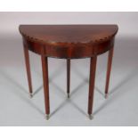 AN EDWARD VII MAHOGANY CARD TABLE in George III style, the D-shaped top with bead and reel carved