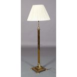 AN EDWARD VII BRASS TELESCOPIC STANDARD LAMP of square column form, stepped base with outset lobed