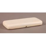 A FINE ENGLISH IVORY CASE SEWING, WRITING AND NAIL COMPENDIUM, the rounded rectangular plain case