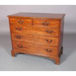 A 19TH CENTURY MAHOGANY CHEST of two short and three long graduated drawers, cockbeaded with brass