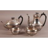 AN EDWARD VII FOUR PIECE SILVER TEA AND COFFEE SERVICE Sheffield 1901 Walker & Hall, of oval half