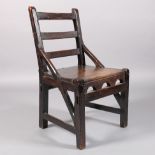 A PRIMITIVE 19TH CENTURY ELM LADDER BACK CHAIR with pegged projecting joints and sloping side