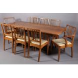 ALAN GRAINGER OF BRANSBY 'ACORN MAN', AN ENGLISH OAK DINING SUITE having refectory table with