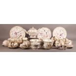 A 19TH CENTURY STAFFORDSHIRE PORCELAIN TEA SERVICE moulded and gilt with garlands of flowers and