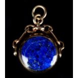 A LAPIS LAZULI AND BLUE JOHN SPINNING FOB in 9ct gold by Douglas Scott Walker, each circular