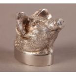 A SILVER PIG'S HEAD BOX, realistically modelled, the pull off lid as a plinth base, London 1897,