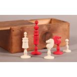 A CONTINENTAL BONE AND RED STAINED BONE CHESS SET, king 9cm high, boxed