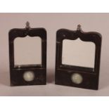 A PAIR OF NORTH INDIAN EBONISED FRAMES, late 19th century, each with arched mirror inset and