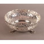 A LATE VICTORIAN SILVER BASKET, London 1900 maker's mark JW FCW, of circular outline with 'C'