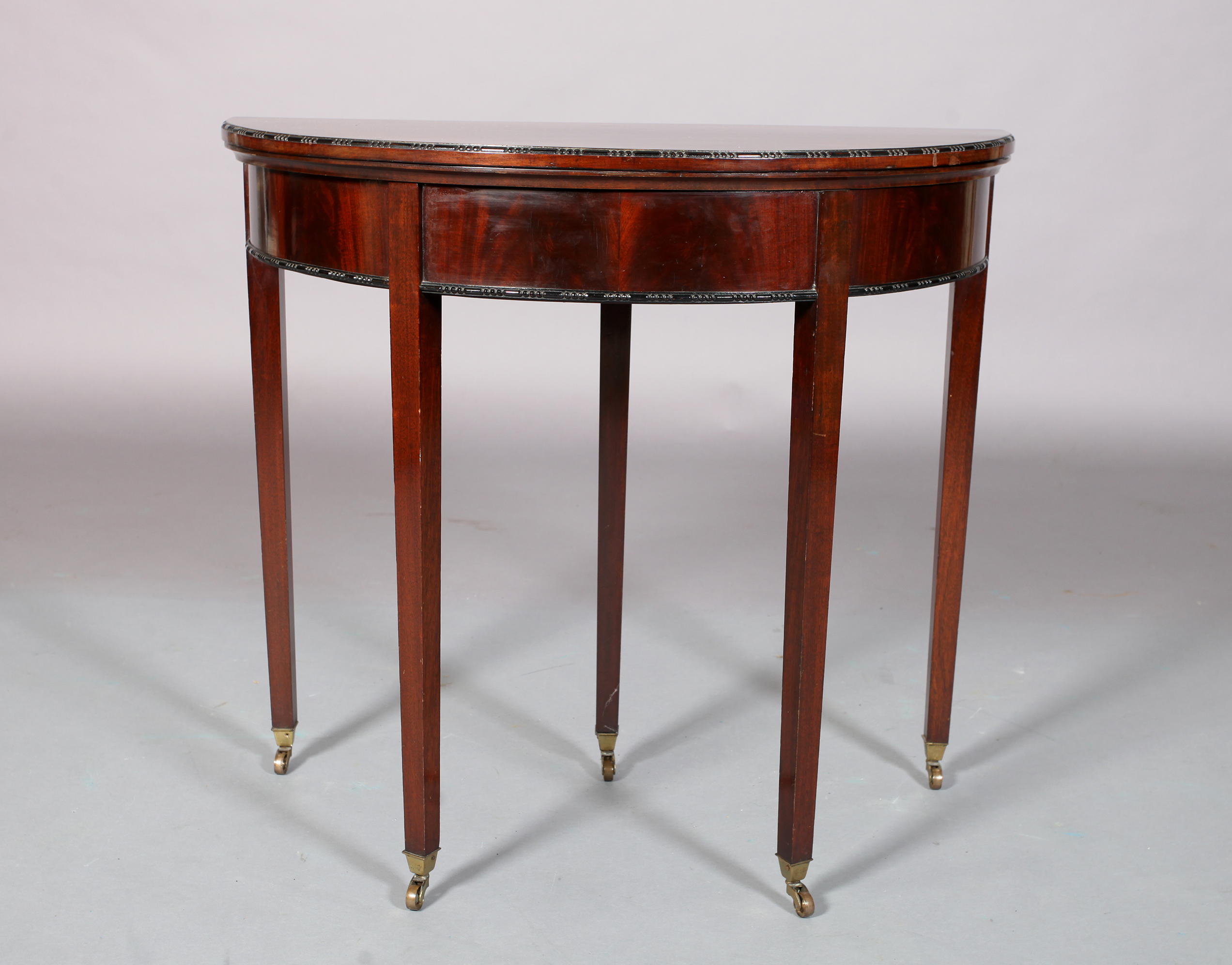 AN EDWARD VII MAHOGANY CARD TABLE in George III style, the D-shaped top with bead and reel carved - Image 2 of 3