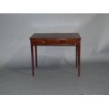 A 19TH CENTURY MAHOGANY SIDE TABLE having a frieze drawer later lined with baise, brass rosette