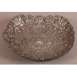 A TURKISH OTTOMAN EMPIRE SILVER METAL DISH, 19th century of leaf shaped oval form with embossed