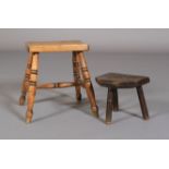 A 19TH CENTURY ELM MILKING STOOL, the chamfered rectangular top with canted front corners and on