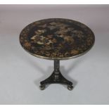 A LATE REGENCY EBONISED AND GILT CHINOISERIE TILT TOP TABLE, circular, gilt with egrets beside a