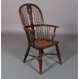 A 19TH CENTURY YEW WOOD AND ELM LOW BACK WINDSOR ARMCHAIR, having a pierced splat and rail back