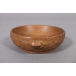 THOMPSON OF KILBURN 'MOUSEMAN', an oak small circular adzed bowl with shallow foot, carved with a