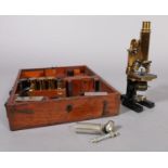 A CARL ZEISS JENA MONOCULAR MICROSCOPE No. 5567, lacquered brass and black japanned, the eyepiece