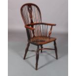 A 19TH CENTURY YEW-WOOD AND ELM WINDSOR ARMCHAIR having a pierced splat and rail back, turned