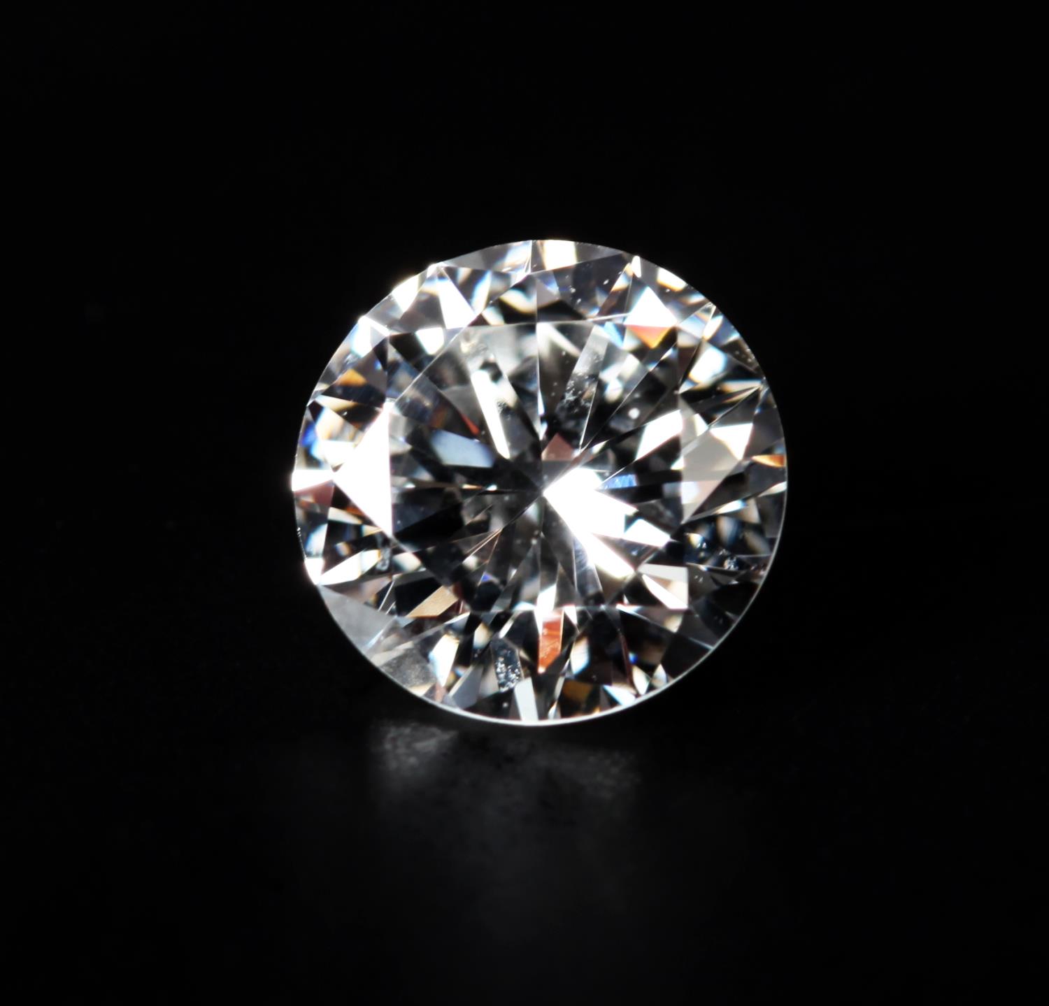 A ROUND BRILLIANT CUT DIAMOND Approximate weight 1.03ct Clarity grade VVS1 Colour grade F Anchor