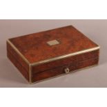 A VICTORIAN BURR WALNUT AND BRASS BOUND BOX, the hinged lid with vacant rectangular cartouche,