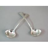 A PAIR OF GEORGE III SILVER SAUCE LADLES London 1792, Peter and Anne Bateman the handles with bright