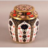 A ROYAL CROWN DERBY GINGER JAR AND COVER pattern 1128, of barrel form, date code for 2007, 22cm high