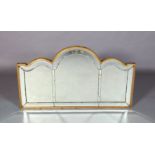 A LATE 19TH CENTURY GILTWOOD WALL MIRROR of triple arched outline having three rectangular plates
