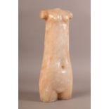 AN ALABASTER SCULPTURE OF A NUDE FEMALE TORSO, the primitive carving with elongated body, 37cm high,