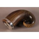 A 19TH CENTURY COW HORN SNUFF MULL with silver mounted rim and hinged lid with shaped mount and