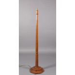 THOMPSON OF KILBURN 'MOUSEMAN' an English oak standard lamp, with octagonal tapered column and