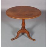 A 19TH CENTURY MAHOGANY TILT TOP OCCASIONAL TABLE, circular, on baluster column, on cabriole legs