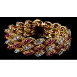 A RUBY AND DIAMOND BRACELET BY KUTCHINSKY in 18ct gold c.1962, the brilliant cut diamonds and