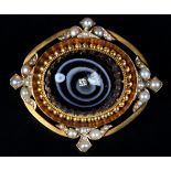 A VICTORIAN AGATE, DIAMOND AND PEARL BROOCH in 15ct gold set to the centre with a correlated