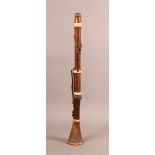 AN EARLY 19TH CENTURY BOXWOOD CLARINET BY HODSOLL, LONDON with brass keys and ivory mounts, 60cm