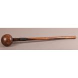 A ZULU HARDWOOD KNOBKERRIE with incised head and wirework decoration, 62cm long