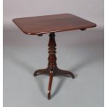 A VICTORIAN MAHOGANY TRIPOD TABLE, the rounded rectangular top above a baluster turned column, three