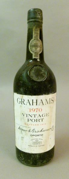 Graham's Vintage Port, 1 bottle, label intact but with damp staining, foil capsule good, level low