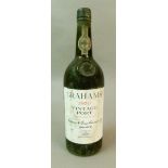 Graham's Vintage Port, 1 bottle, label intact but with damp staining, foil capsule good, level low