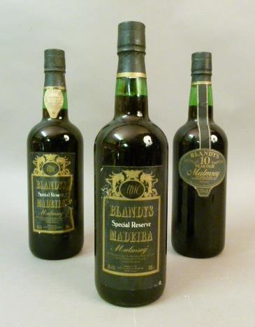 Blandy's Special Reserve Madeira Malmsey, 2 bottles, one label good the other torn, foil capsules