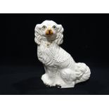 A Staffordshire Pottery White Seated Dog