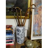 A Group Of Eight Silver Banded Vintage Walking Canes Within A Pottery Stick Stand