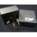 A 9ct Gold Clogau Celtic Bangle In Original Presentation Box