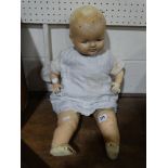 A Mid Century Papier Mache & Cloth Baby Doll