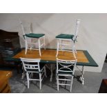 A Cast Iron Based Farmhouse Kitchen Style Table, Together With Four White Painted Chairs